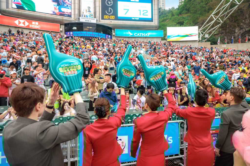 Cathay cabin crew have fun with the crowd in the South Stand. Cathay cabin crew have fun with the crowd in the South Stand.