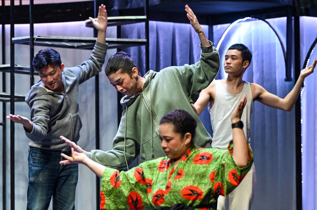 Loo (centre) warms up with other actors during a rehearsal before their performance at a theatre in Singapore last year. Photo: AFP Loo (centre) warms up with other actors during a rehearsal before their performance at a theatre in Singapore last year. Photo: AFP