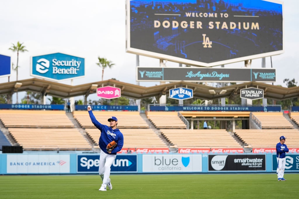 Shohei Ohtani throws during warm-ups before the LA Dodgers’ spring training game against the LA Angels on Monday, March 25. Photo: AP Shohei Ohtani throws during warm-ups before the LA Dodgers’ spring training game against the LA Angels on Monday, March 25. Photo: AP