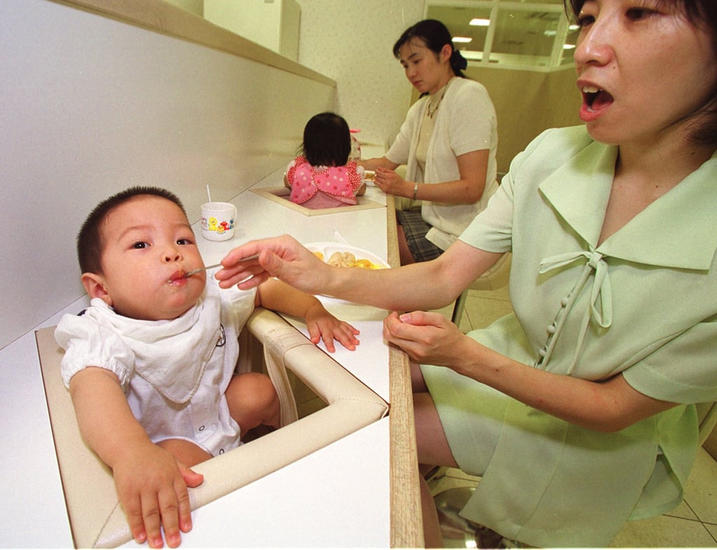 A mother feeds her 11-month-old at a restaurant for infants in a department store in Tokyo. Instead of meeting babies’ needs, Tokyo-based Oji intends to shift its focus to the other end of Japan’s population spectrum. Photo: AP A mother feeds her 11-month-old at a restaurant for infants in a department store in Tokyo. Instead of meeting babies’ needs, Tokyo-based Oji intends to shift its focus to the other end of Japan’s population spectrum. Photo: AP