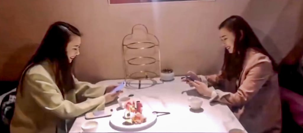 The identical twins are making up for lost time after being separated for three decades. Photo: Baidu The identical twins are making up for lost time after being separated for three decades. Photo: Baidu