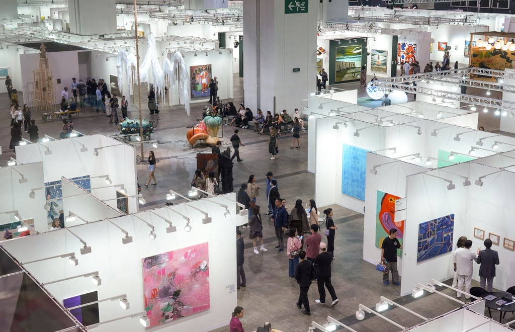 At the Hong Kong Convention and Exhibition Centre in Wan Chai, visitors take in Art Basel Hong Kong 2024, with the fair back at its pre-pandemic scale this year. Photo: Eugene Lee At the Hong Kong Convention and Exhibition Centre in Wan Chai, visitors take in Art Basel Hong Kong 2024, with the fair back at its pre-pandemic scale this year. Photo: Eugene Lee
