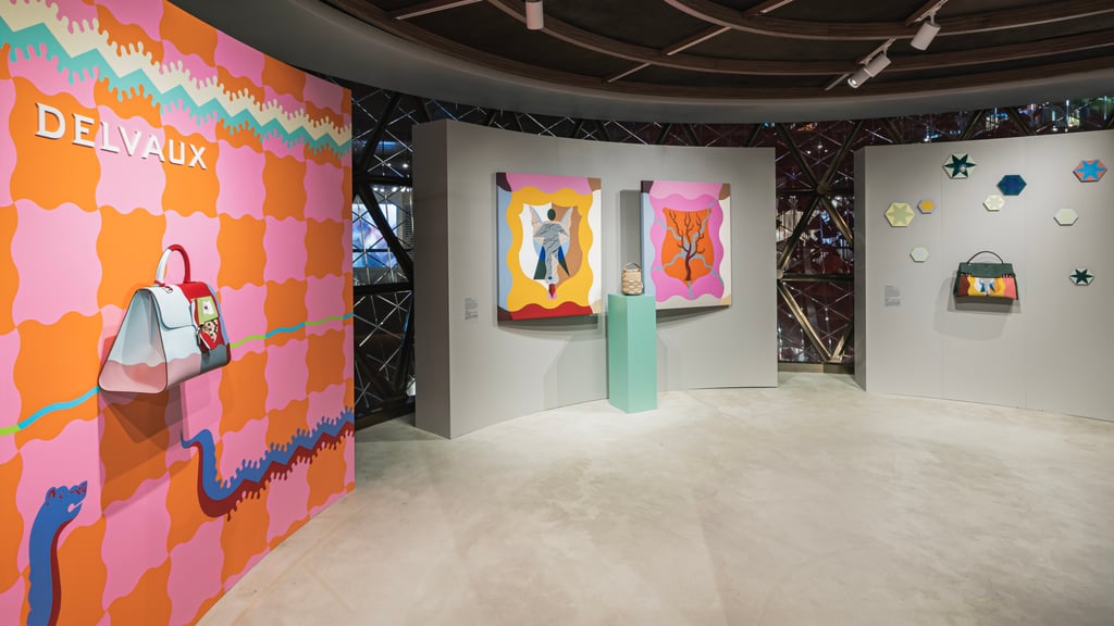 Pieces from Delvaux’s Mutualism collection, designed with artist Kasper Bosmans, are displayed against equally vivid backdrops Pieces from Delvaux’s Mutualism collection, designed with artist Kasper Bosmans, are displayed against equally vivid backdrops