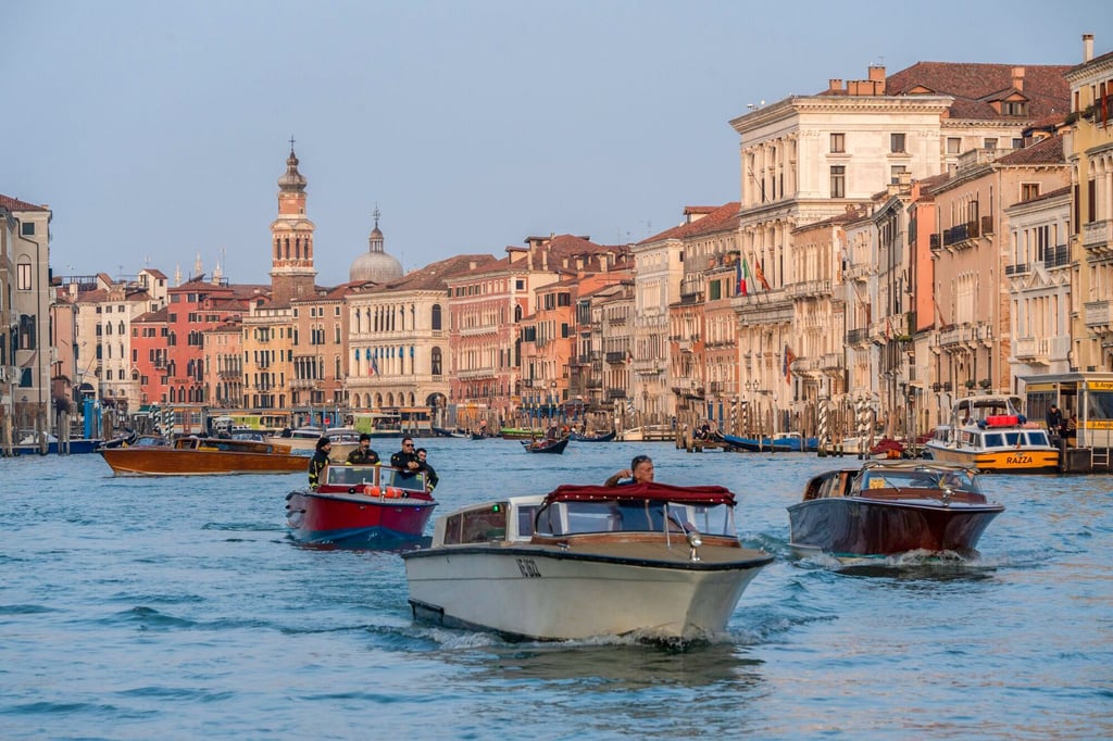 Venice has already banned some ocean-going liners and is now in the process of introducing a €5 admission fee for peak-time visitors to the city. Photo: Bloomberg Venice has already banned some ocean-going liners and is now in the process of introducing a €5 admission fee for peak-time visitors to the city. Photo: Bloomberg
