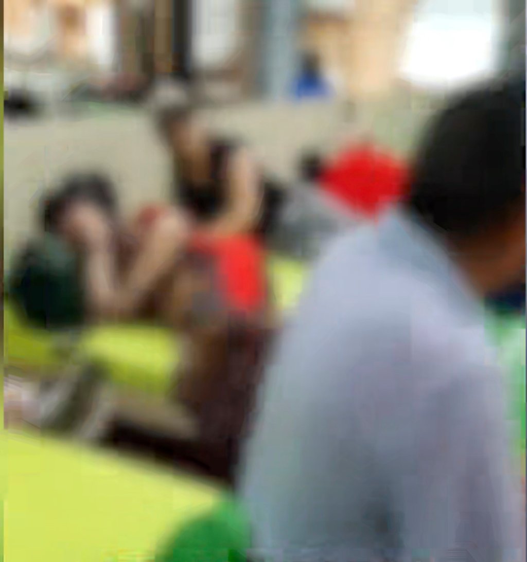 A video filmed by a member of the group shows them sitting and lying on beds inside the shop. Photo: Baidu A video filmed by a member of the group shows them sitting and lying on beds inside the shop. Photo: Baidu