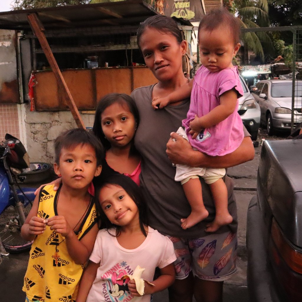 Maria Fedy and her three daughters and nephew in suburban Quezon City southwest of Manila, in the Philippines. Photo: Raissa Robles Maria Fedy and her three daughters and nephew in suburban Quezon City southwest of Manila, in the Philippines. Photo: Raissa Robles