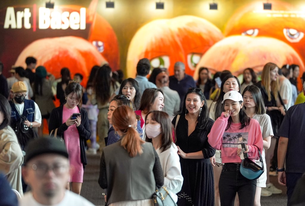 Visitors head to Art Basel at the Hong Kong Convention and Exhibition Centre in Wan Chai. Photo: Eugene Lee Visitors head to Art Basel at the Hong Kong Convention and Exhibition Centre in Wan Chai. Photo: Eugene Lee
