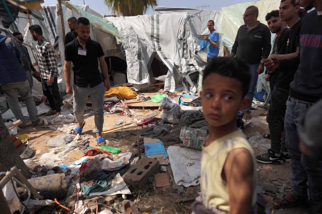 Damage at a makeshift camp in front of the Al-Aqsa Martyrs Hospital in Deir al-Balah after it was hit by an Israeli strike. Photo: AFP