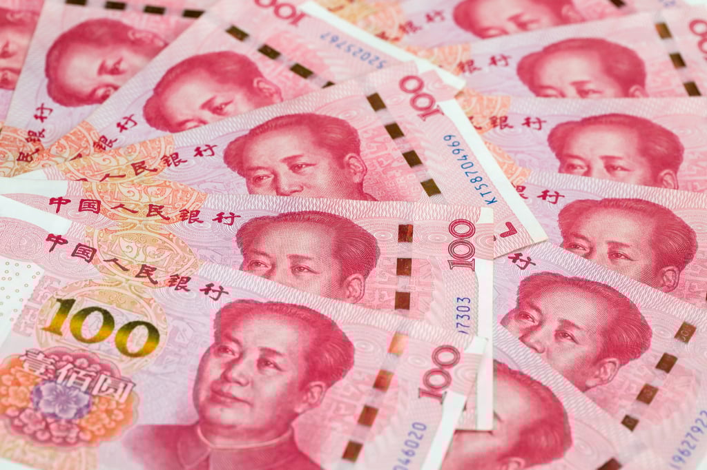 Chinese one-hundred yuan banknotes are arranged for a photograph in Hong Kong, China. Photo: Bloomberg