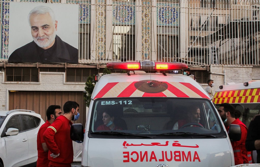 Members of Syrian Red Crescent work near the damaged site after what Syrian and Iranian media described as an Israeli air strike on Iran’s consulate in the Syrian capital Damascus on Monday. Photo: Reuters Members of Syrian Red Crescent work near the damaged site after what Syrian and Iranian media described as an Israeli air strike on Iran’s consulate in the Syrian capital Damascus on Monday. Photo: Reuters