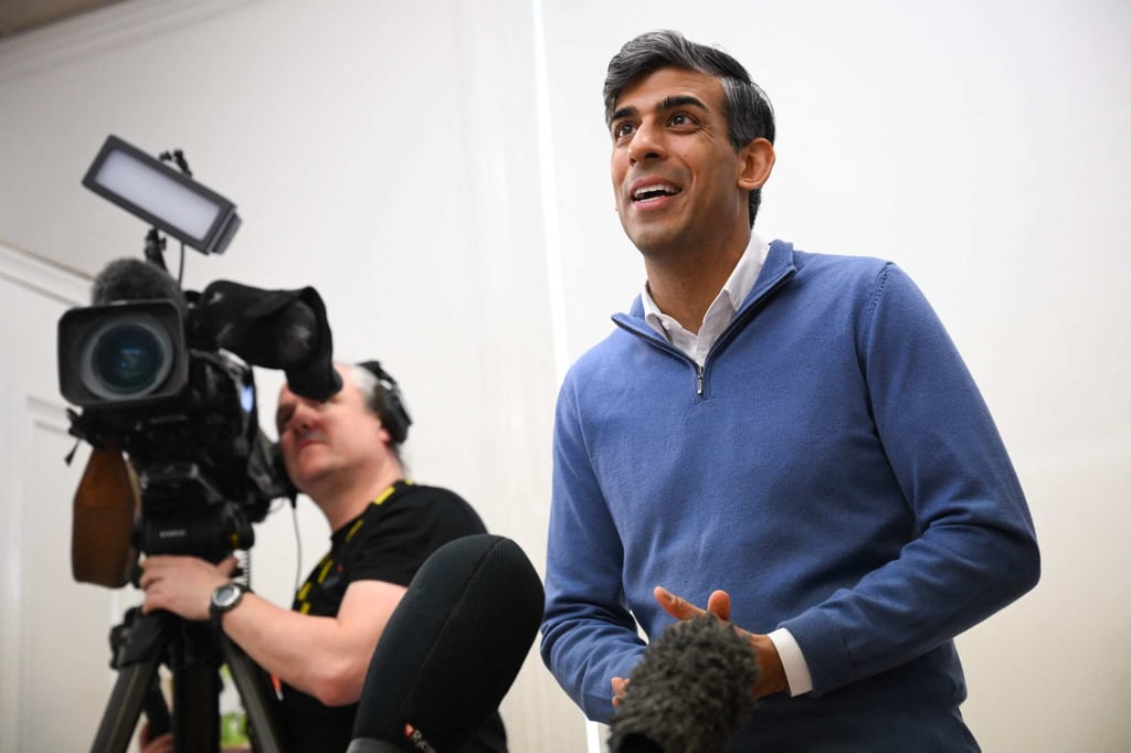 Britain’s Prime Minister Rishi Sunak (right) makes a statement to members of the media in Hartlepool, England, on Tuesday. Photo: AFP Britain’s Prime Minister Rishi Sunak (right) makes a statement to members of the media in Hartlepool, England, on Tuesday. Photo: AFP