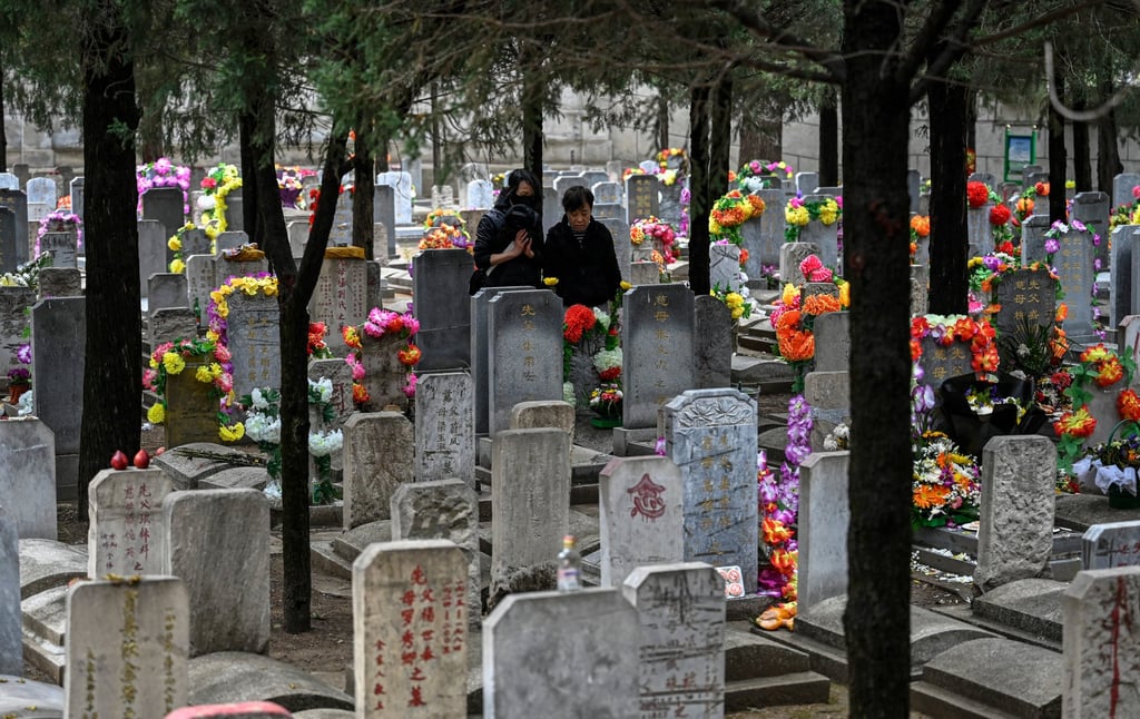 People visit the tombs of relatives during the annual Ching Ming Festival at Beijing’s Babaoshan Cemetery in April 2023. Photo: AFP People visit the tombs of relatives during the annual Ching Ming Festival at Beijing’s Babaoshan Cemetery in April 2023. Photo: AFP