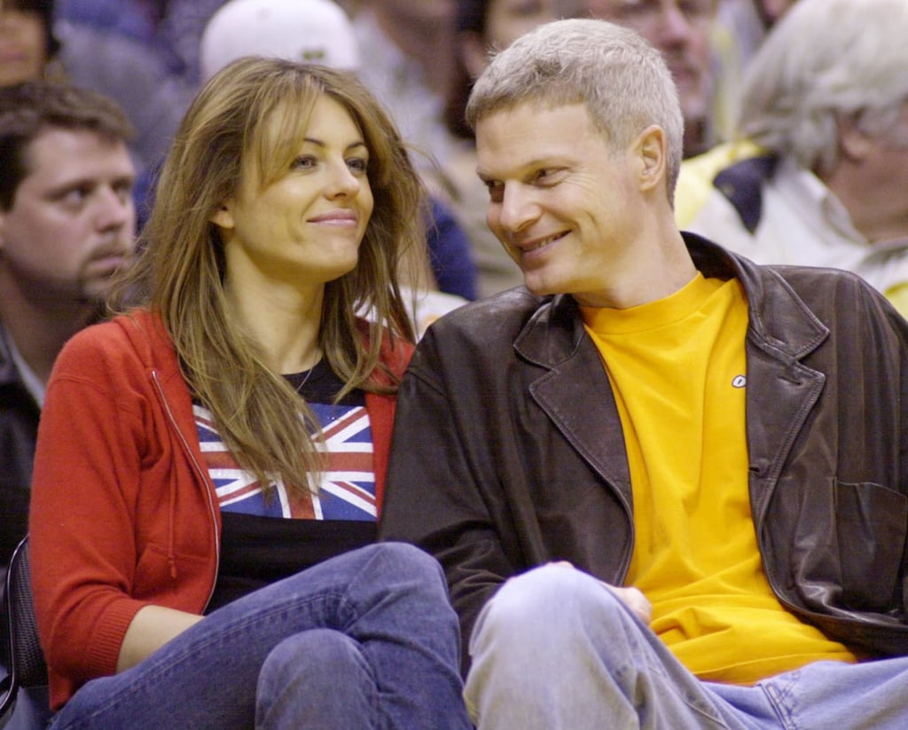Elizabeth Hurley and American film producer Steve Bing at a Lakers game in Los Angeles in 2001. Photo: Reuters