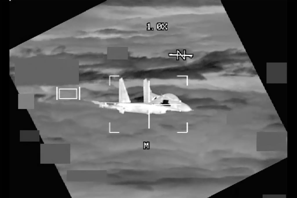 Pentagon footage from October of what it says was a Chinese fighter jet flying close to an American B-52 bomber over the South China Sea. Photo: US Indo-Pacific Command via AP Pentagon footage from October of what it says was a Chinese fighter jet flying close to an American B-52 bomber over the South China Sea. Photo: US Indo-Pacific Command via AP