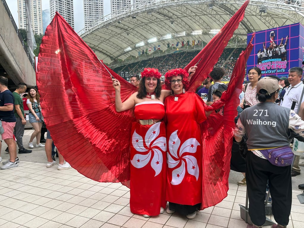 Gioia Sloane (left) and Alison Lyons celebrate the city at the Hong Kong Sevens. Photo: Connor Mycroft Gioia Sloane (left) and Alison Lyons celebrate the city at the Hong Kong Sevens. Photo: Connor Mycroft