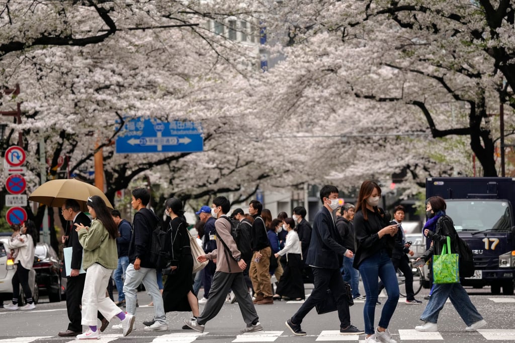 People walk across a road in Tokyo on Monday. Cases of “flesh eating” STSS have been reported in 45 of Japan’s 47 prefectures. Photo: EPA-EFE People walk across a road in Tokyo on Monday. Cases of “flesh eating” STSS have been reported in 45 of Japan’s 47 prefectures. Photo: EPA-EFE
