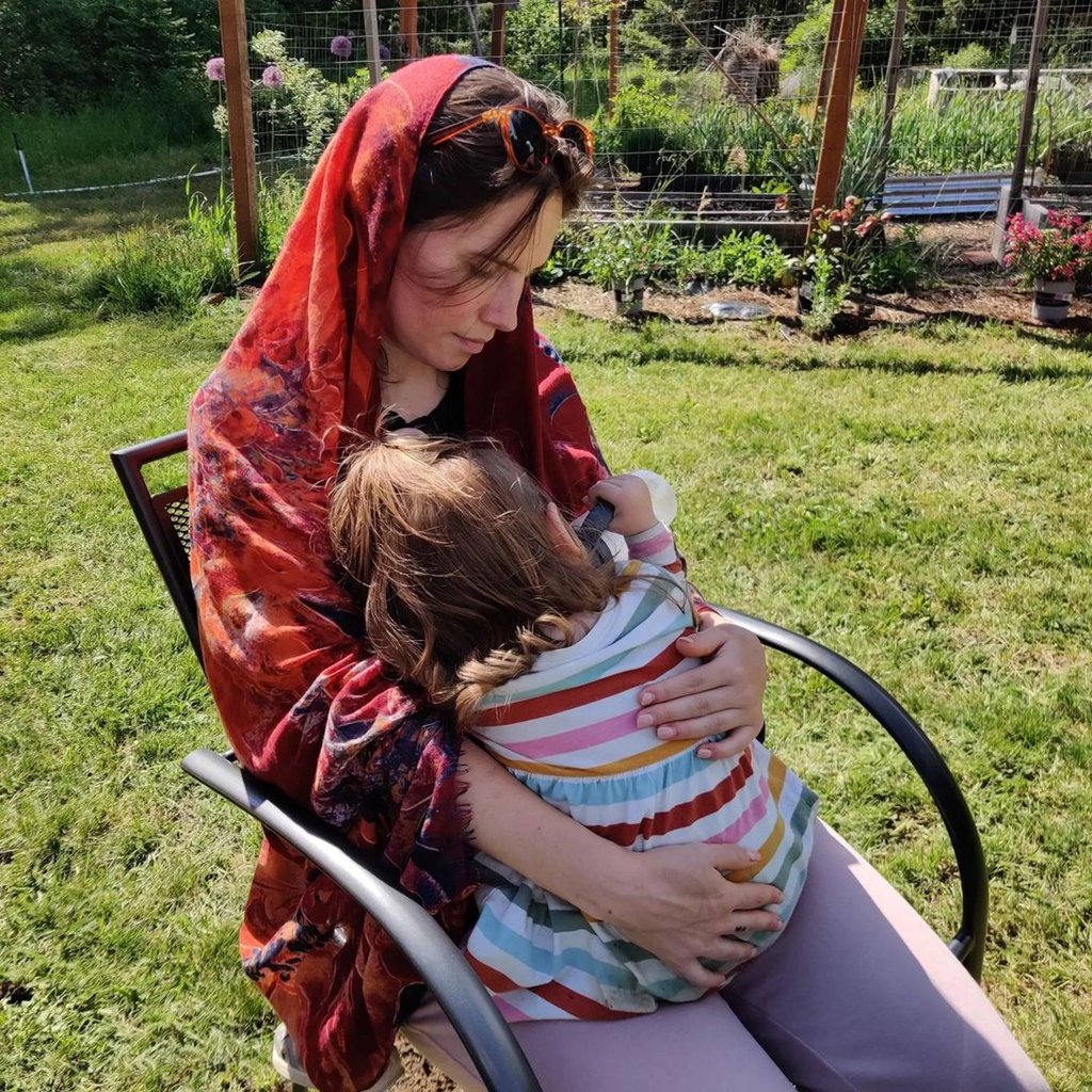 Amanda Knox with one of her children. Photo: @amamaknox/Instagram