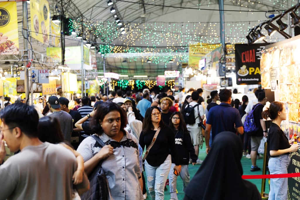 People at the Geylang Serai Ramadan Bazaar in Singapore on Tuesday. Singapore is among the few countries in the region where consciousness about India’s global role is more well-known, says academic Amitendu Palit. Photo: EPA-EFE