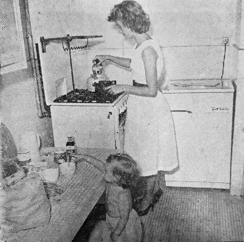 Mrs Cynthia Mitchell and her daughter, Carole, in the kitchen of their new home in Chungking Mansions, Hong Kong. Photo: SCMP