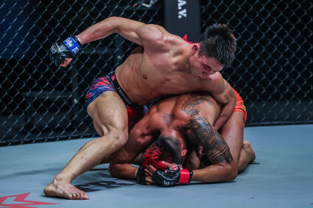 Hu Yong punches Yodkaikaew Fairtex on his way to a unanimous decision win in 2021. Photo: ONE Championship Hu Yong punches Yodkaikaew Fairtex on his way to a unanimous decision win in 2021. Photo: ONE Championship