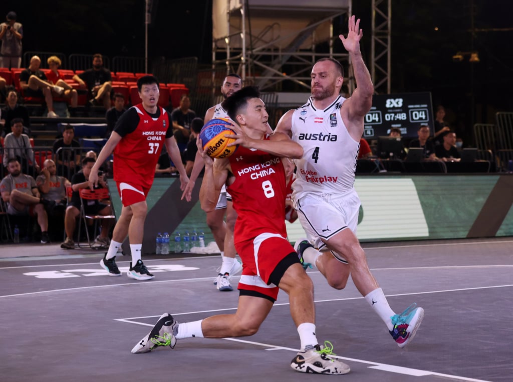 Hong Kong’s Oliver Xu (left) in action against Austria on Friday. Photo: Yik Yeung-man Hong Kong’s Oliver Xu (left) in action against Austria on Friday. Photo: Yik Yeung-man