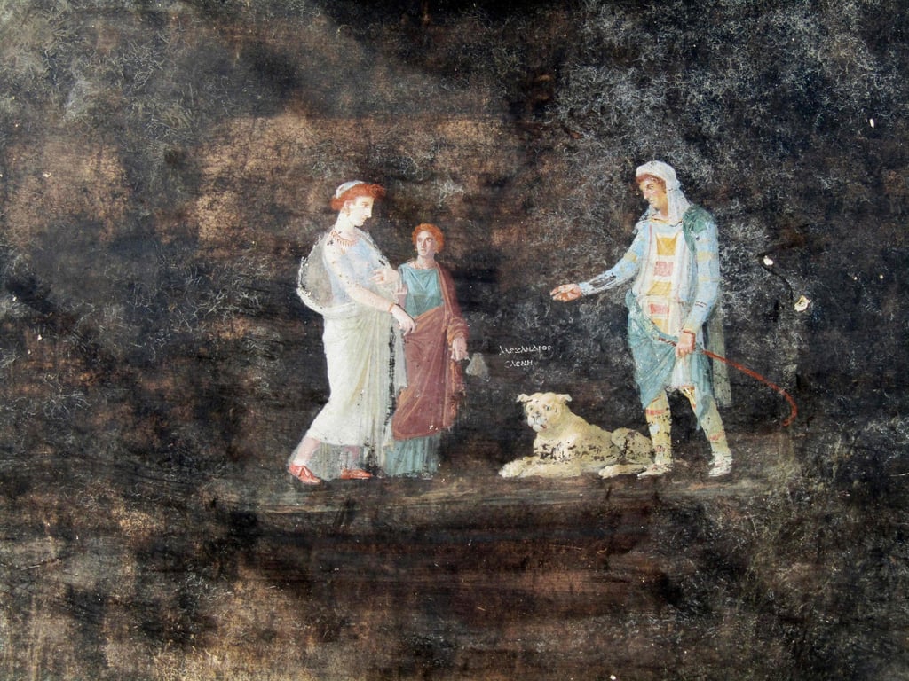 A fresco depicting mythological characters Helen and Paris according to a Greek inscription placed between the two figures in a banqueting room in Pompeii, near Naples, Italy. Photo: AFP