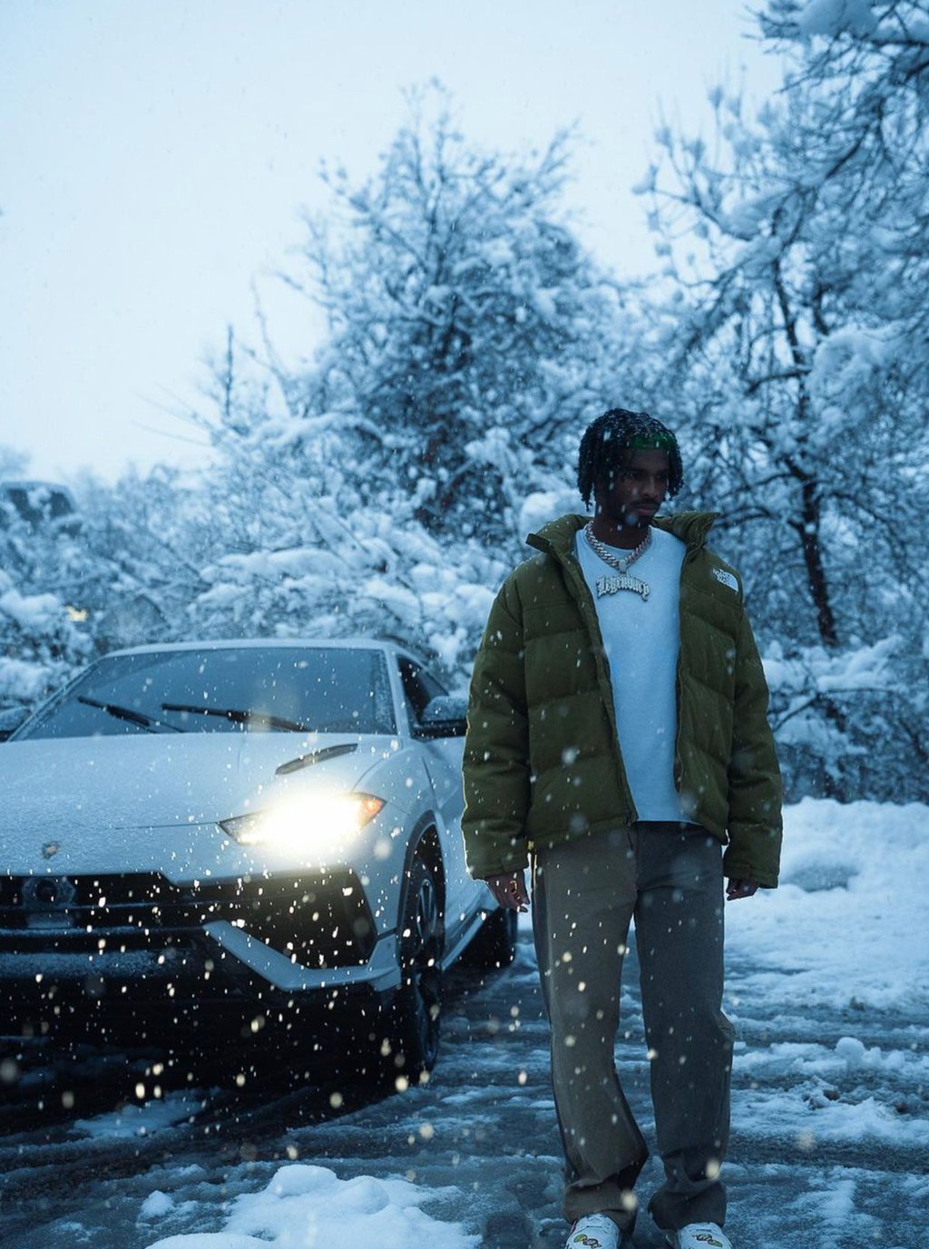 Shedeur Sanders rocking North Face and Louis Vuitton in the snow. Photo: @shedeursanders/Instagram
