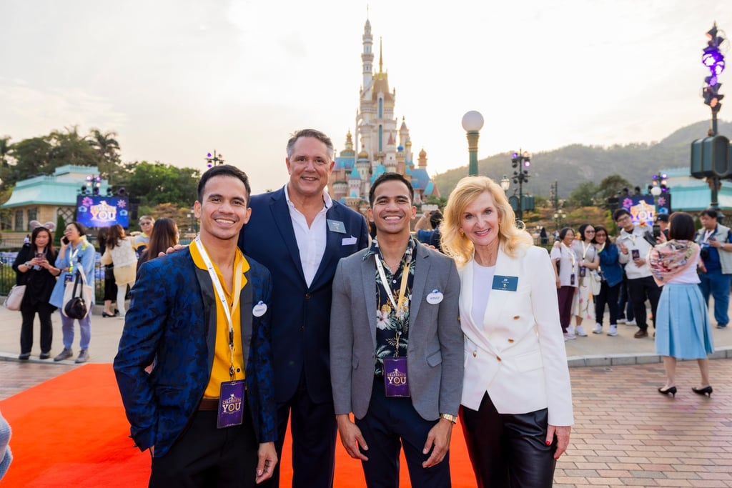 The Escalona twins with Michael Moriarty (second left), managing director of Hong Kong Disneyland Resort, and Jill Estorino, president and managing director of Disney Parks International, at the long-service awards ceremony. The Escalona twins with Michael Moriarty (second left), managing director of Hong Kong Disneyland Resort, and Jill Estorino, president and managing director of Disney Parks International, at the long-service awards ceremony.