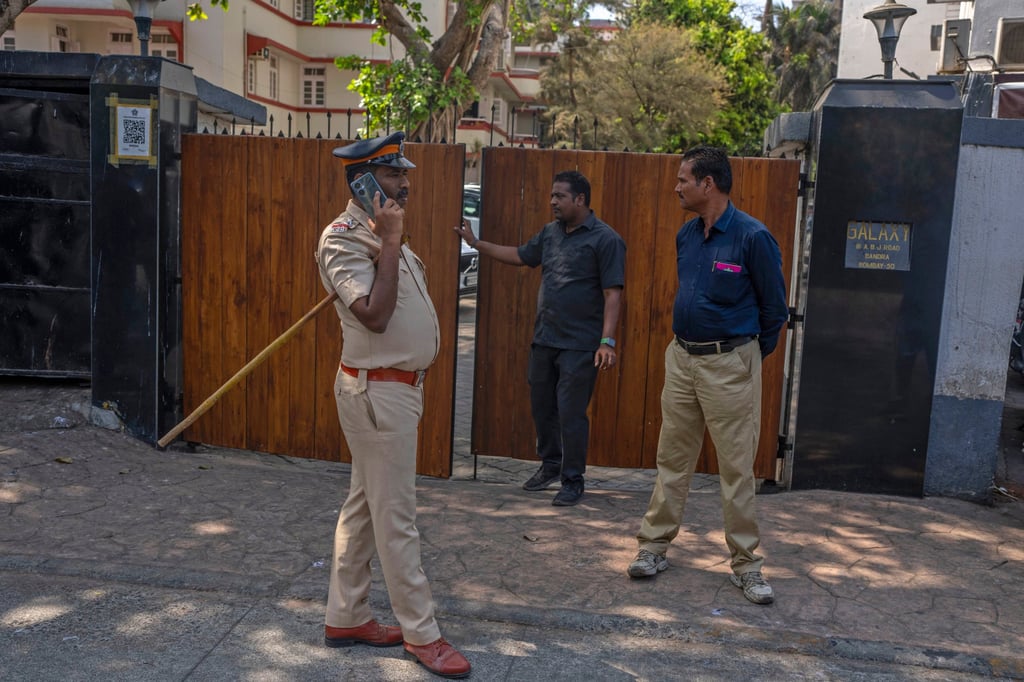 A police officer outside the residence of Bollywood actor Salman Khan after reports of a shooting. Photo: AP