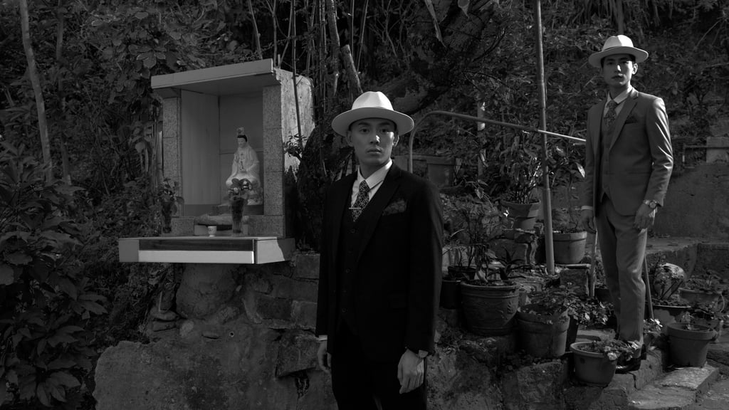 Sparrow on the Sea, artist Yang Fudong’s black and white “architectural film”, is being screened on the M+ Facade through June 9. Photo: Handout