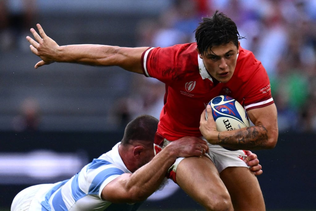 Wales’ wing Louis Rees-Zammit is tackled by Argentina’s Marcos Kremer during the France 2023 Rugby World Cup quarter-final in October 2023. Photo: AFP Wales’ wing Louis Rees-Zammit is tackled by Argentina’s Marcos Kremer during the France 2023 Rugby World Cup quarter-final in October 2023. Photo: AFP