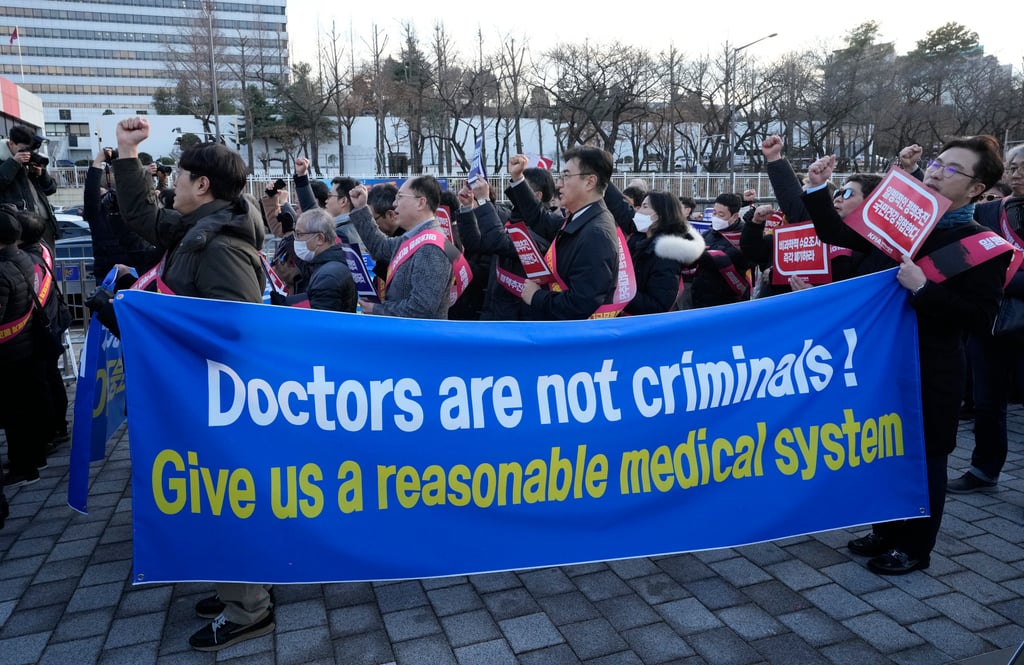 Doctors stage a rally against the government’s medical policy near the presidential office in Seoul, South Korea. Photo: AP Doctors stage a rally against the government’s medical policy near the presidential office in Seoul, South Korea. Photo: AP
