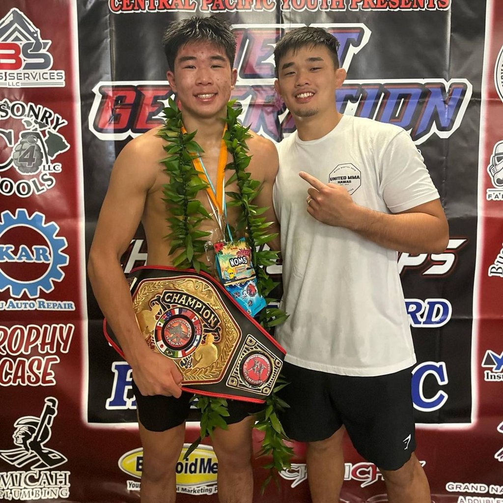 Adrian Lee (left) with brother and two-division champion Christian. Photo: ONE Championship