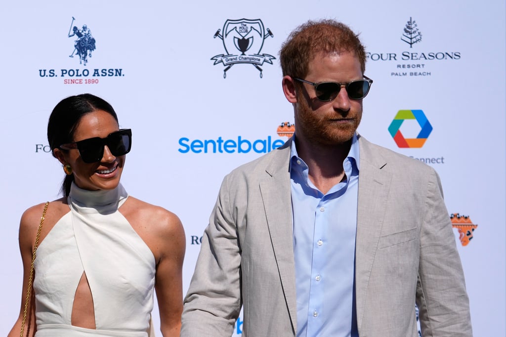 Britain’s Prince Harry, right, and wife Meghan Markle, Duchess of Sussex, at the Royal Salute Polo Challenge in Wellington, Florida on April 12. Photo: AP
