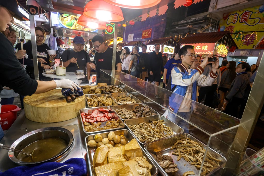 Food stalls at the night market. Among the popular dishes available are local delicacies such as dim sum, beef offal stew, fish balls and siu mai. Photo: Jonathan Wong Food stalls at the night market. Among the popular dishes available are local delicacies such as dim sum, beef offal stew, fish balls and siu mai. Photo: Jonathan Wong