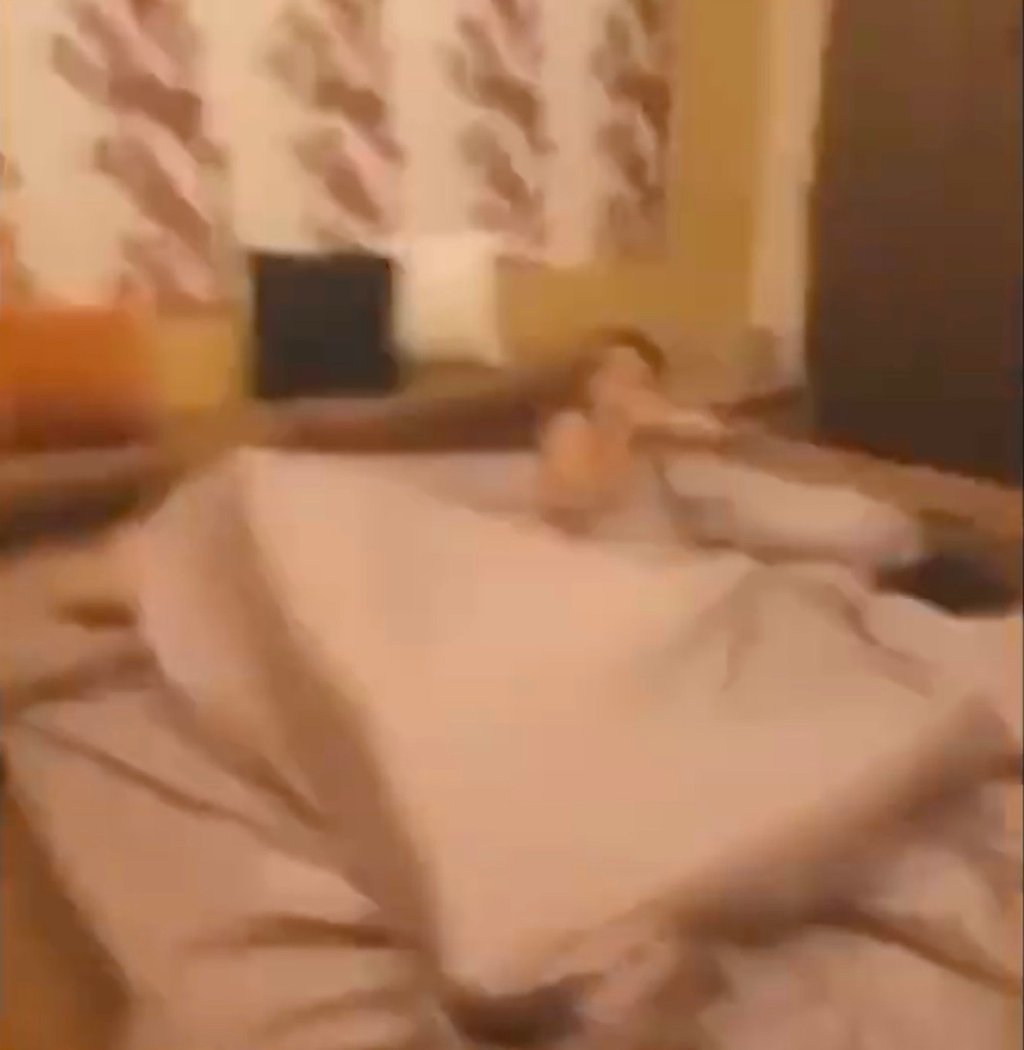 The couple were caught, red-handed, naked under the covers by the politician’s husband. Photo: Weibo The couple were caught, red-handed, naked under the covers by the politician’s husband. Photo: Weibo