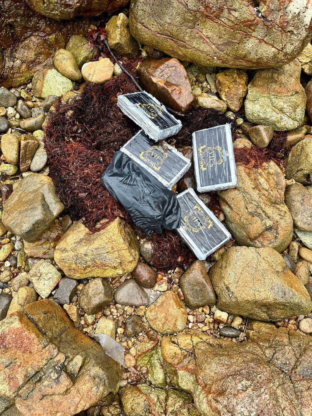 Slabs of the drug were found at Nam She Wan on Sunday afternoon. Photo: Handout Slabs of the drug were found at Nam She Wan on Sunday afternoon. Photo: Handout