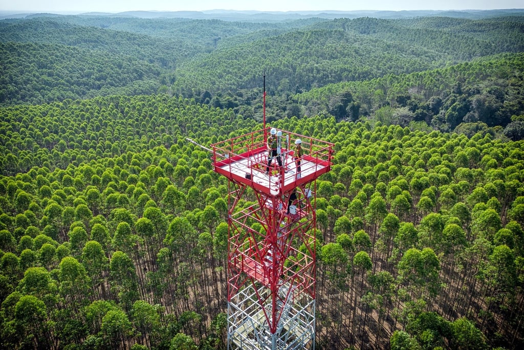 Scientists at APRIL collect data from one of its greenhouse gas flux towers, which monitor levels of methane and carbon dioxide across the forestry and oil-palm plantation and conservation areas of Riau province, on the Indonesian island of Sumatra. Scientists at APRIL collect data from one of its greenhouse gas flux towers, which monitor levels of methane and carbon dioxide across the forestry and oil-palm plantation and conservation areas of Riau province, on the Indonesian island of Sumatra.