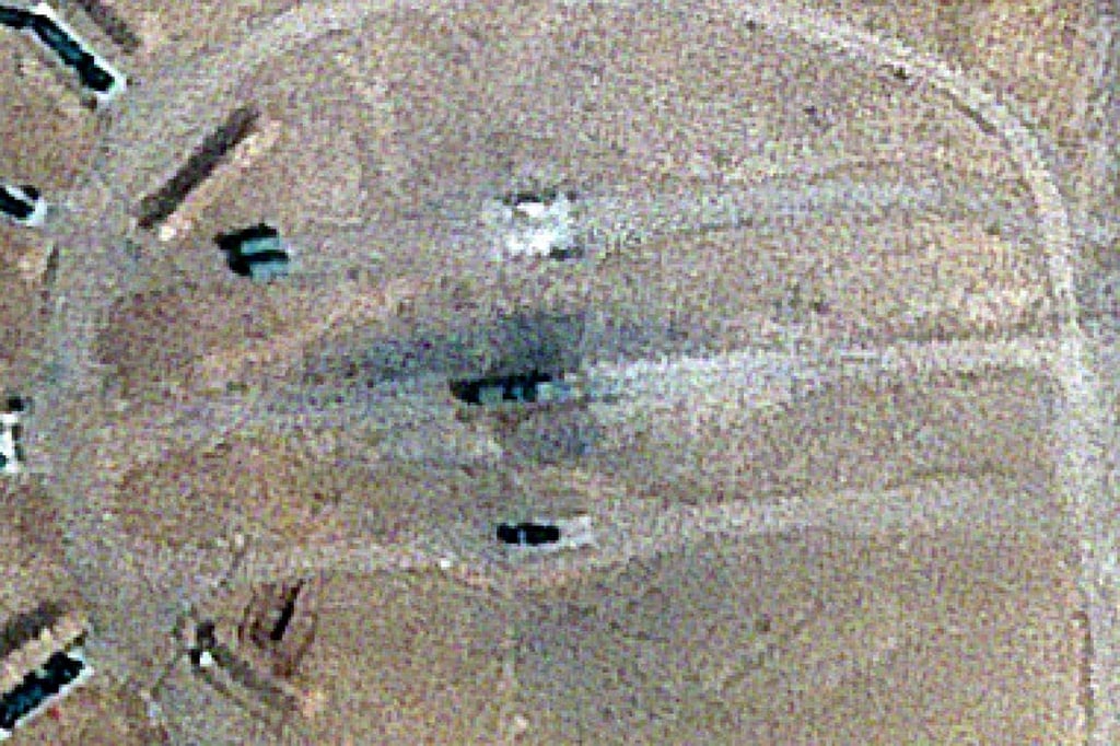 Burn marks surround what analysts identify as a radar system in Isfahan, Iran. Photo: Planet Labs PBC via AP