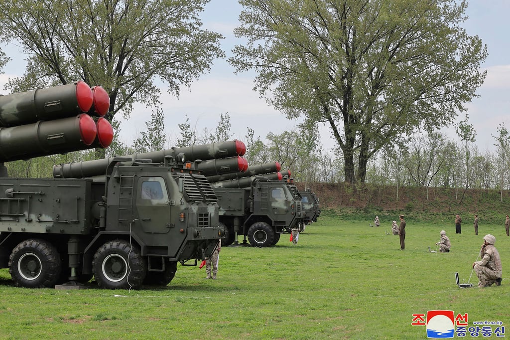 This photo provided by the North Korean government shows what it says rocket drills that simulate a nuclear counter-attack against enemies, at an undisclosed place in North Korea on April 22. Photo: KCNA/KNS via AP