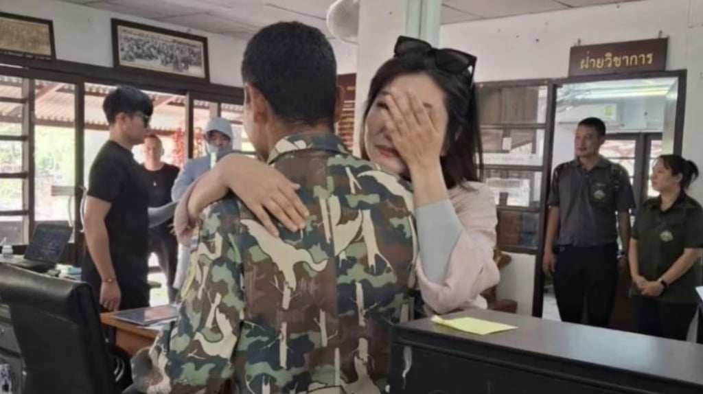 Emotional return: Wang embraces one of the rescuers who helped save her life in 2019. Photo: World Journal Emotional return: Wang embraces one of the rescuers who helped save her life in 2019. Photo: World Journal