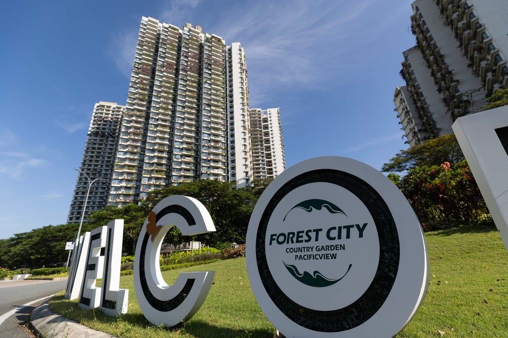 A sign in front of residential apartments in Chinese developer Country Garden’s Forest City in Johor Bahru. Photo: EPA-EFE A sign in front of residential apartments in Chinese developer Country Garden’s Forest City in Johor Bahru. Photo: EPA-EFE