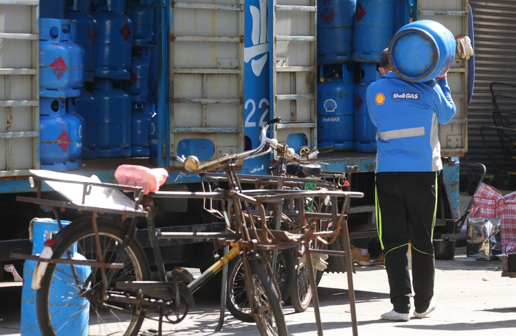 The minimum wage will also be reviewed annually, an insider says. Photo: Dickson Lee