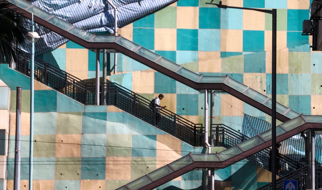A resident walks down stairs in Fortress Hill on Hong Kong Island. Photo: Yik Yeung-man