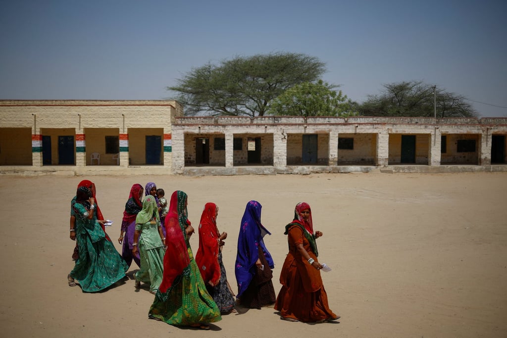 Women arrive at a polling station to cast their vote during the second phase of the general election, in Barmer, Rajasthan, India, on Friday. Photo: Reuters Women arrive at a polling station to cast their vote during the second phase of the general election, in Barmer, Rajasthan, India, on Friday. Photo: Reuters