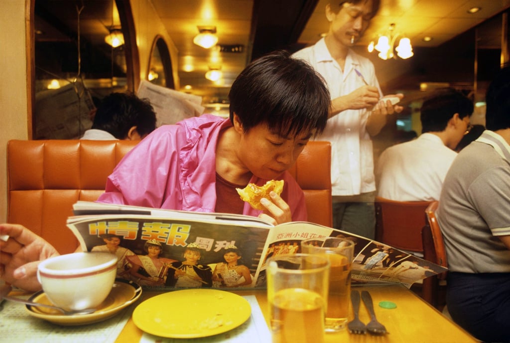 A Hong Kong cafe scene captured by Canadian photographer Greg Girard’ and featured in his M+ show. Photo: M+/Greg Girard A Hong Kong cafe scene captured by Canadian photographer Greg Girard’ and featured in his M+ show. Photo: M+/Greg Girard
