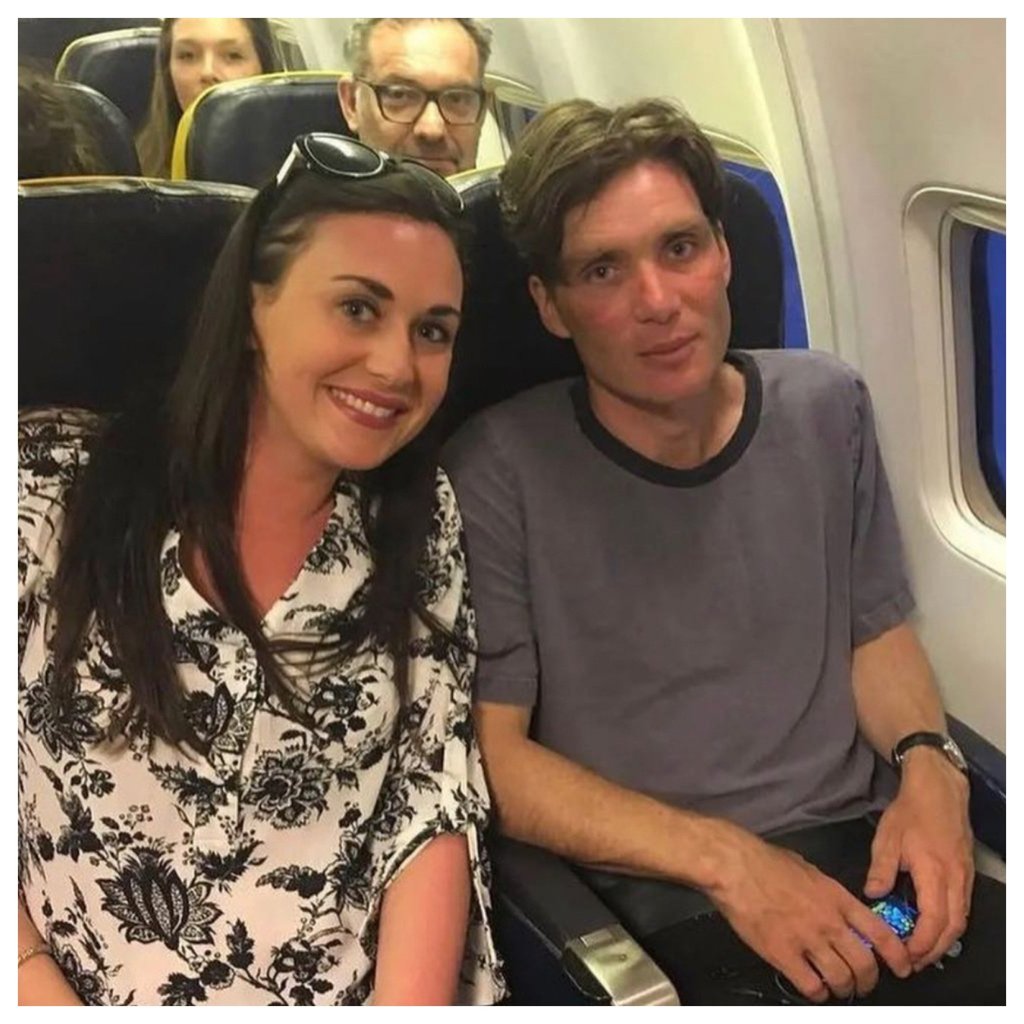 His face says it all: Cillian Murphy cornered for a photo with a fan on a plane. Photo: @movieshmood/Instagram