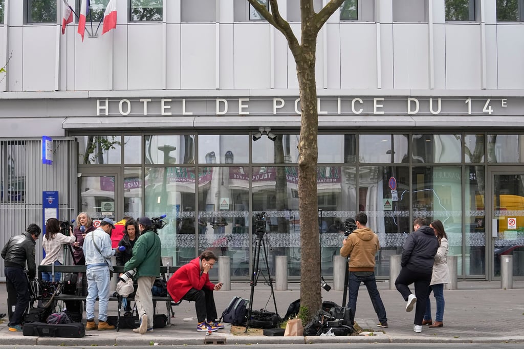 Reporters outside the Paris police station where French actor Gerard Depardieu was being questioned on Monday. Photo: AP Reporters outside the Paris police station where French actor Gerard Depardieu was being questioned on Monday. Photo: AP