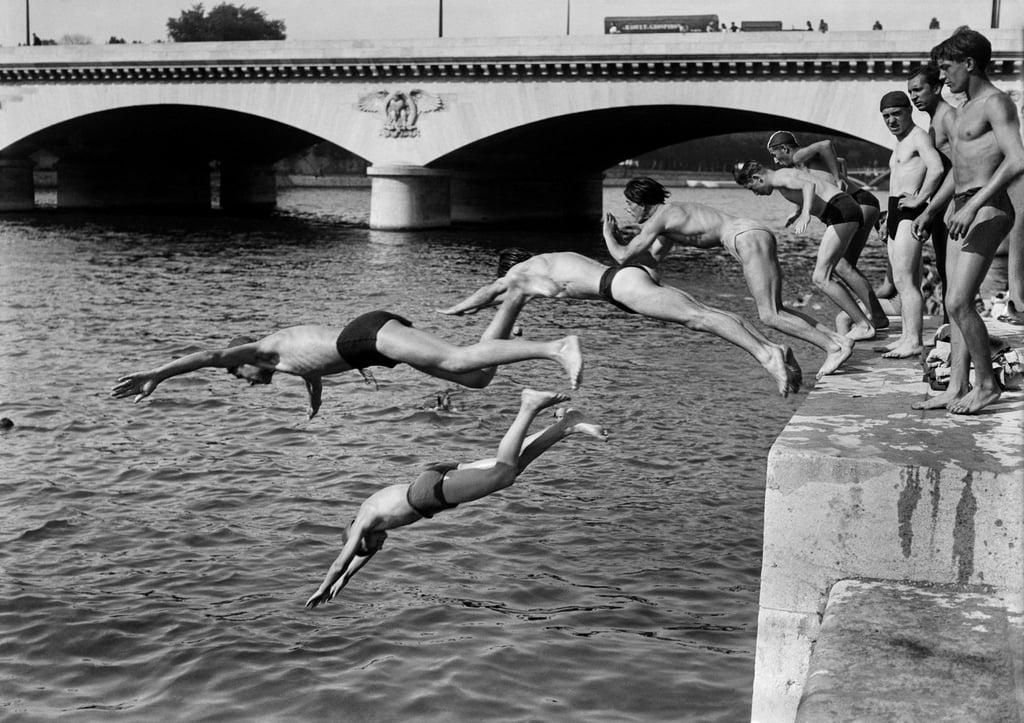 People dive into the Seine in June 1946 in Paris. The river will be the star of the opening ceremony of the Games on July 26, and public swimming in the river could be authorised after that for the first time in decades. Photo: AFP