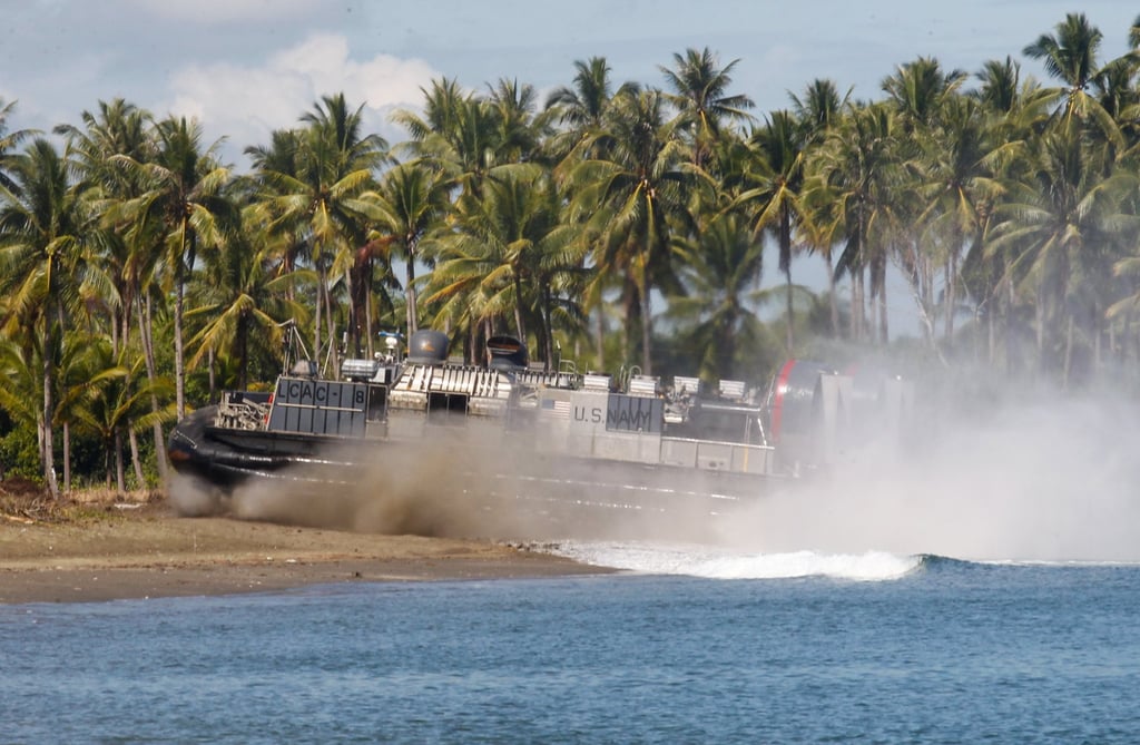 A Landing Craft Air Cushion carrying an M142 High Mobility Artillery Rocket System seen before the start of the live fire drills. Photo: Jeoffrey Maitem